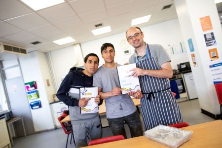 Learners showcasing their cookbook 