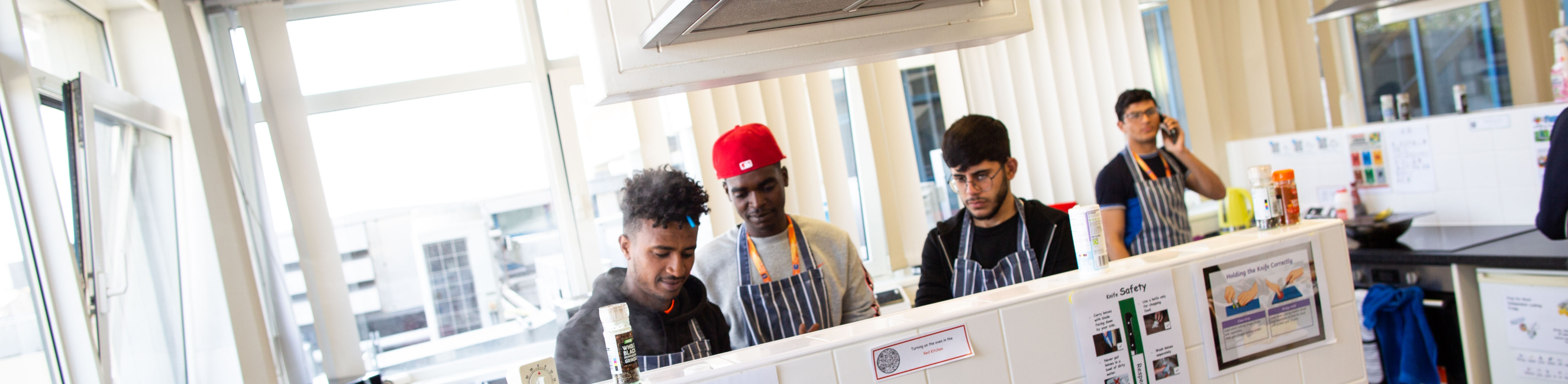 ESOL learners cooking in the kitchen