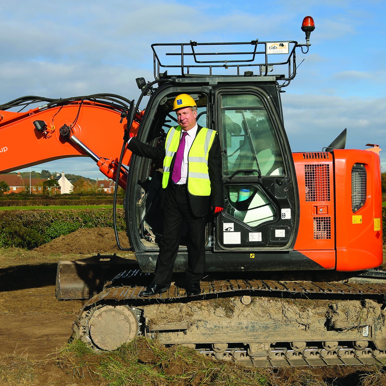 Dr Paul on a digger