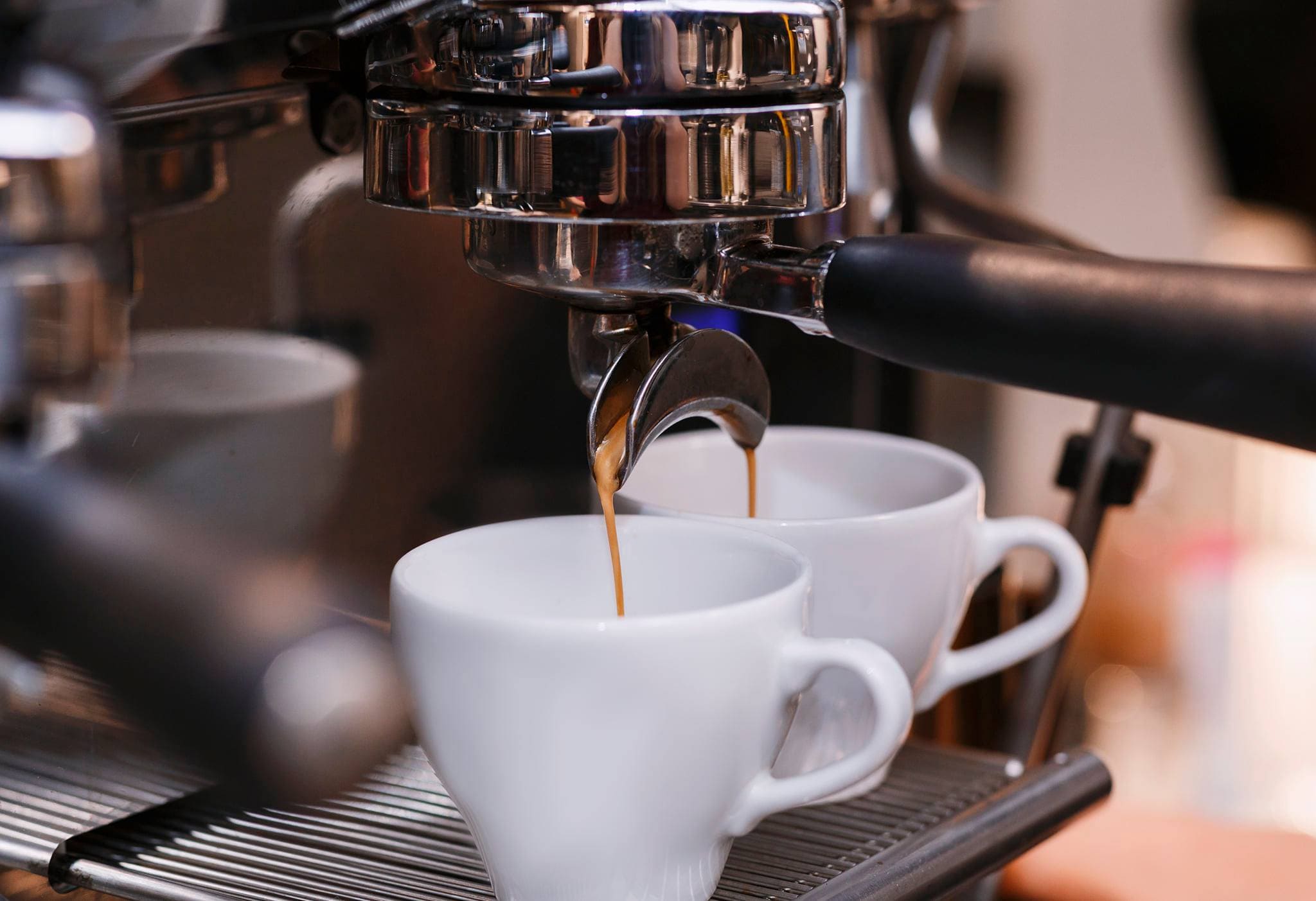 coffee machine pouring espresso