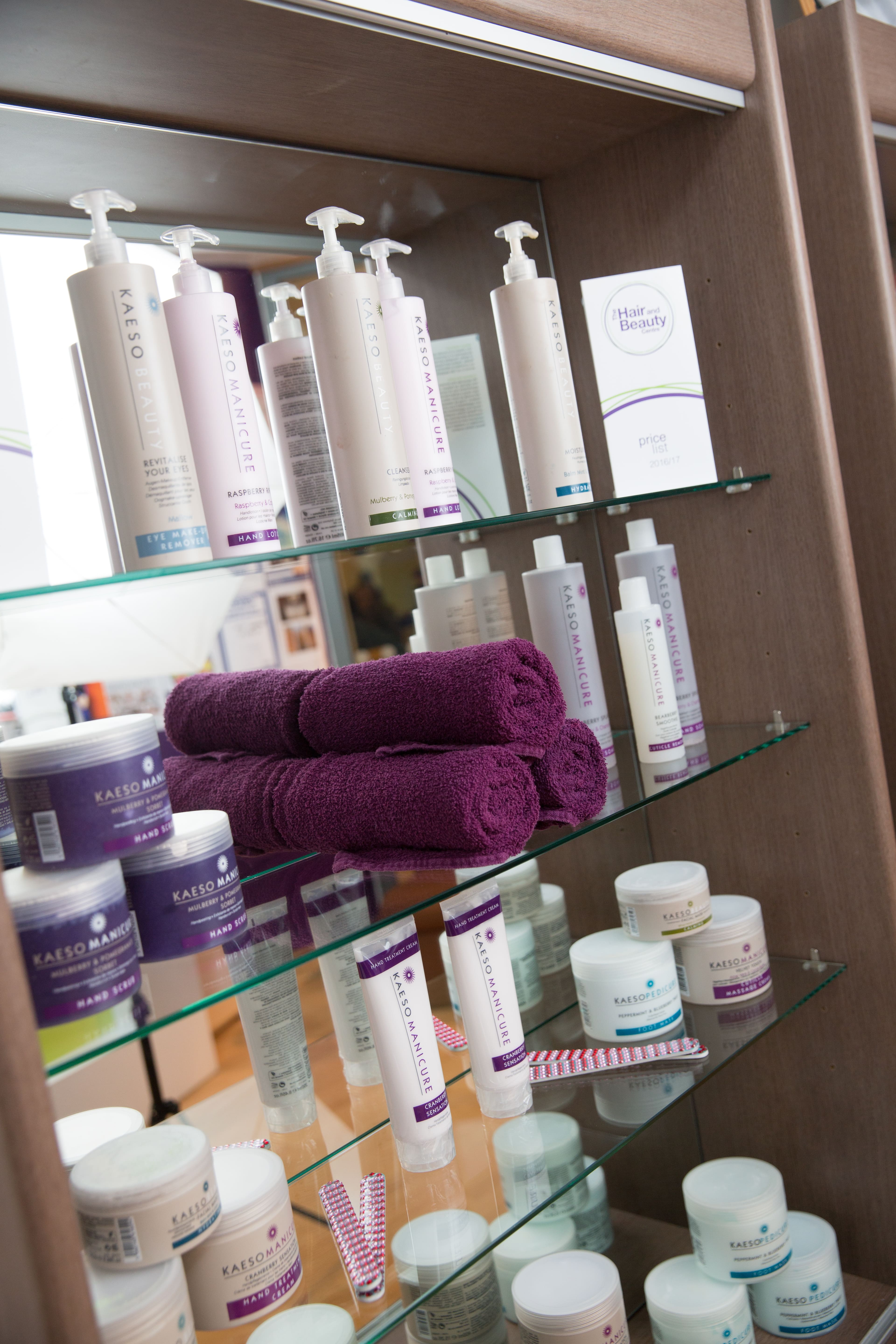 towels and cosmetics on shelves