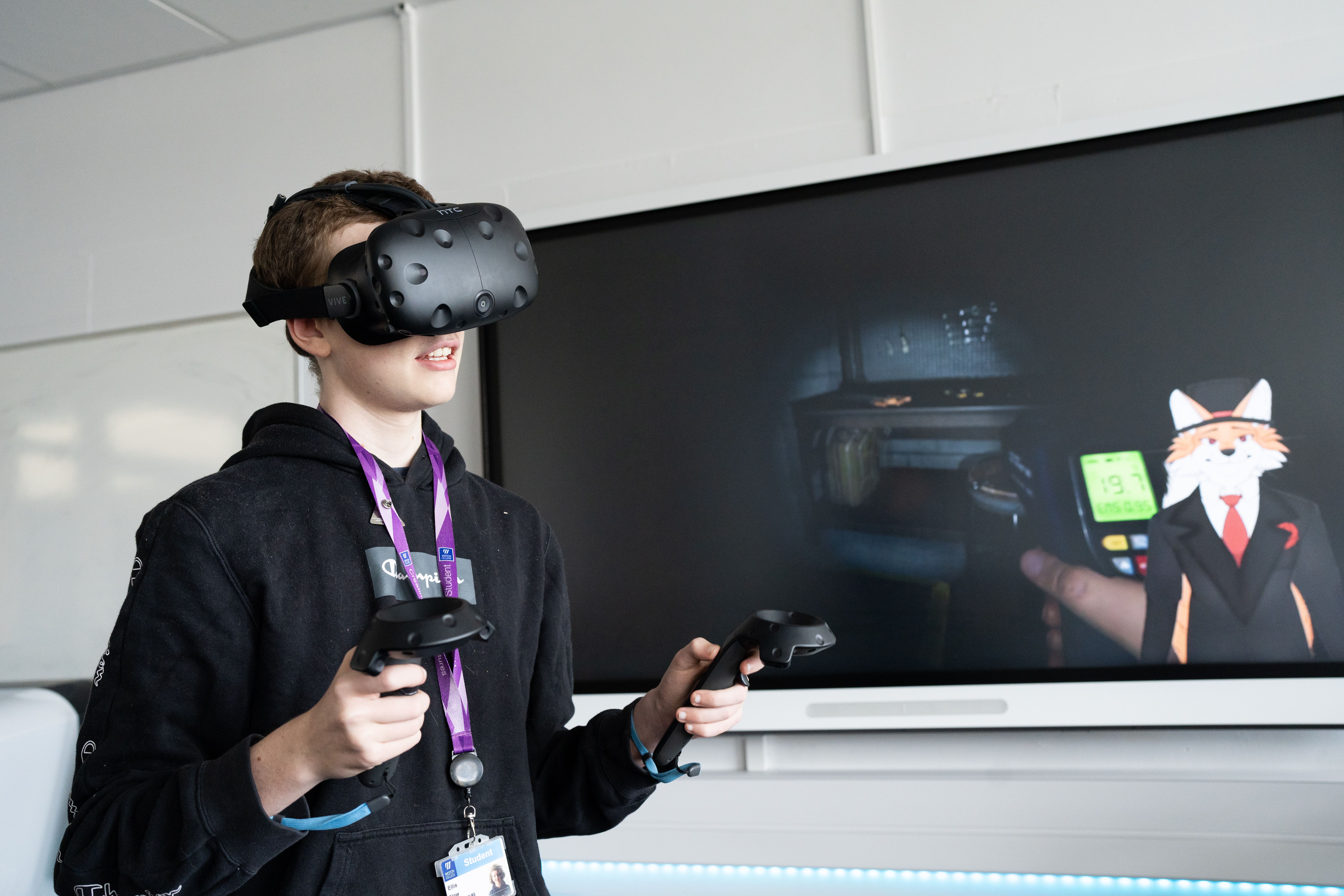 student uses VR headset 