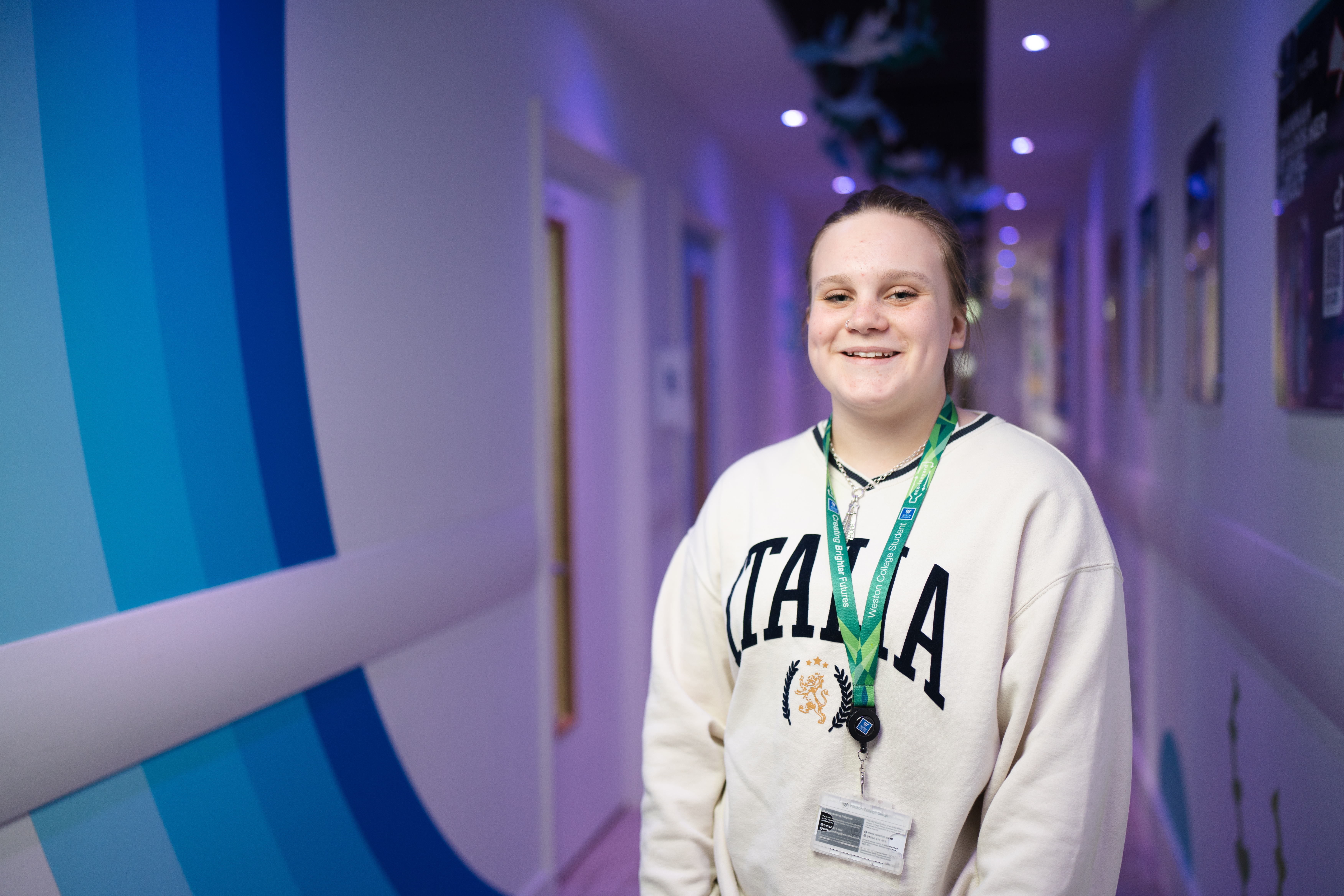 early years student standing in early years corridor