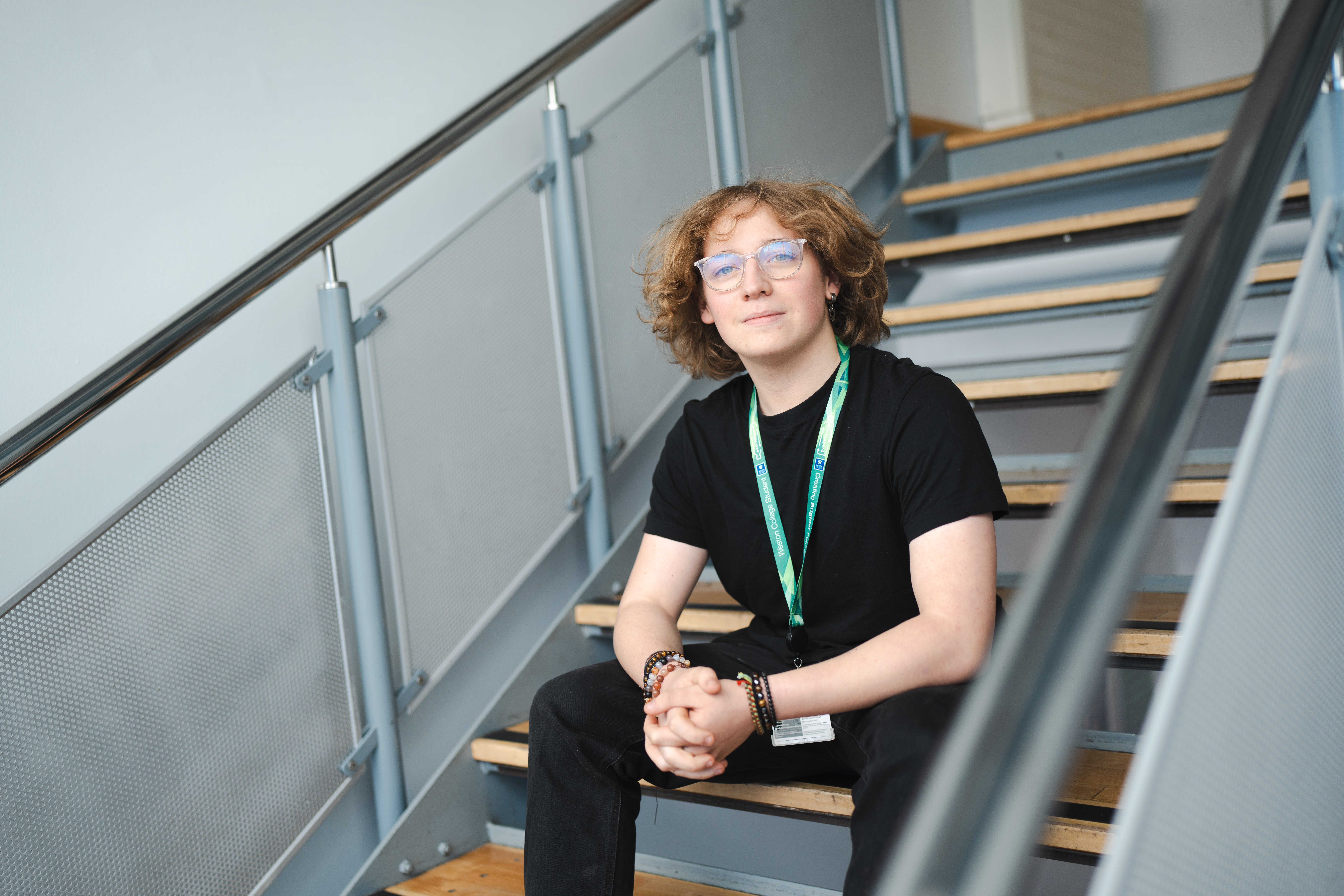 male engineering student in front of staircase