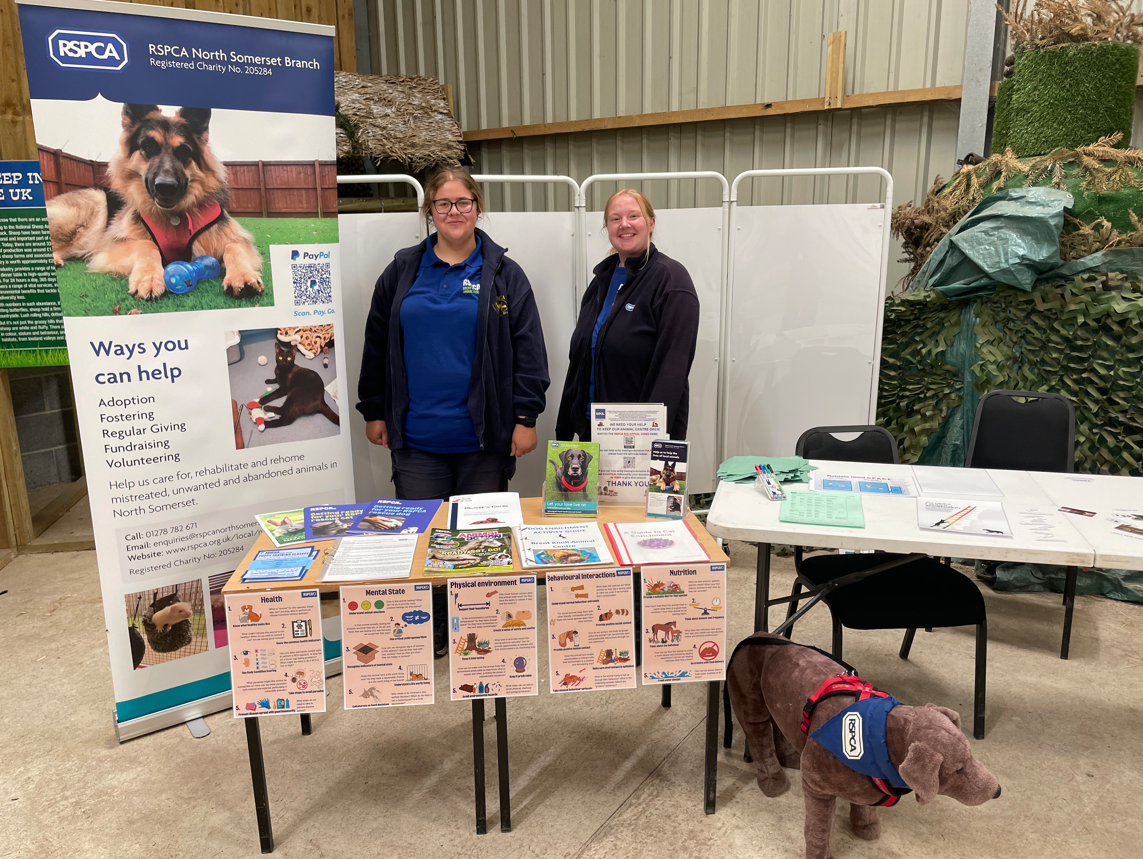 Former student, Grace, and her colleague from the RSPCA standing smiling