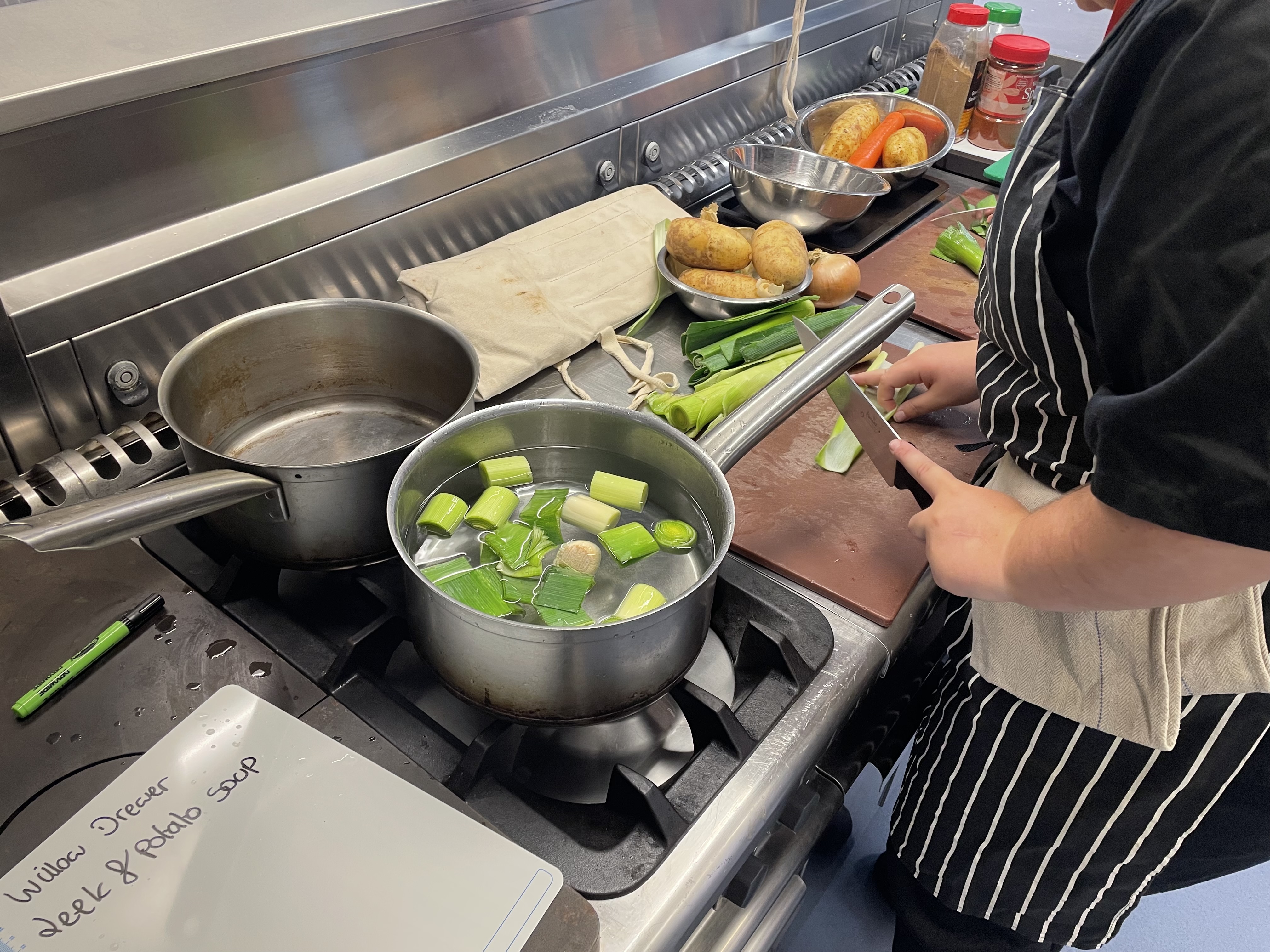 Hospitality and Catering students making soup