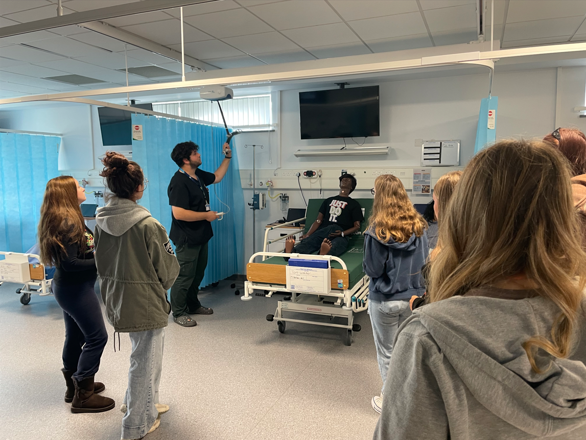 Health & Social Care students being introduced to the SIM room