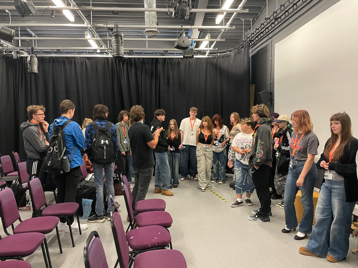 Media students gathered together to discuss a task