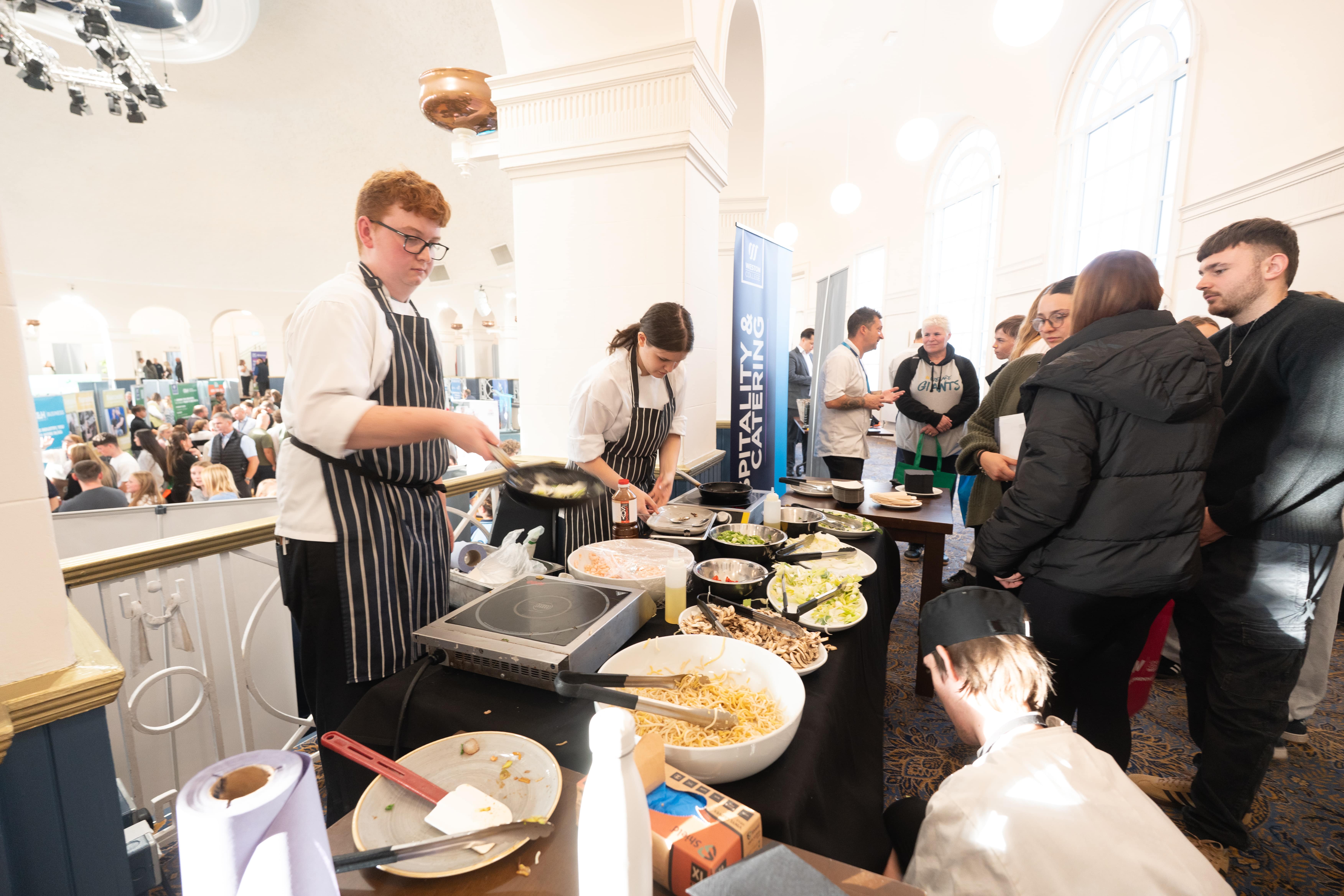 Hospitality Learners showcasing skills to attendees
