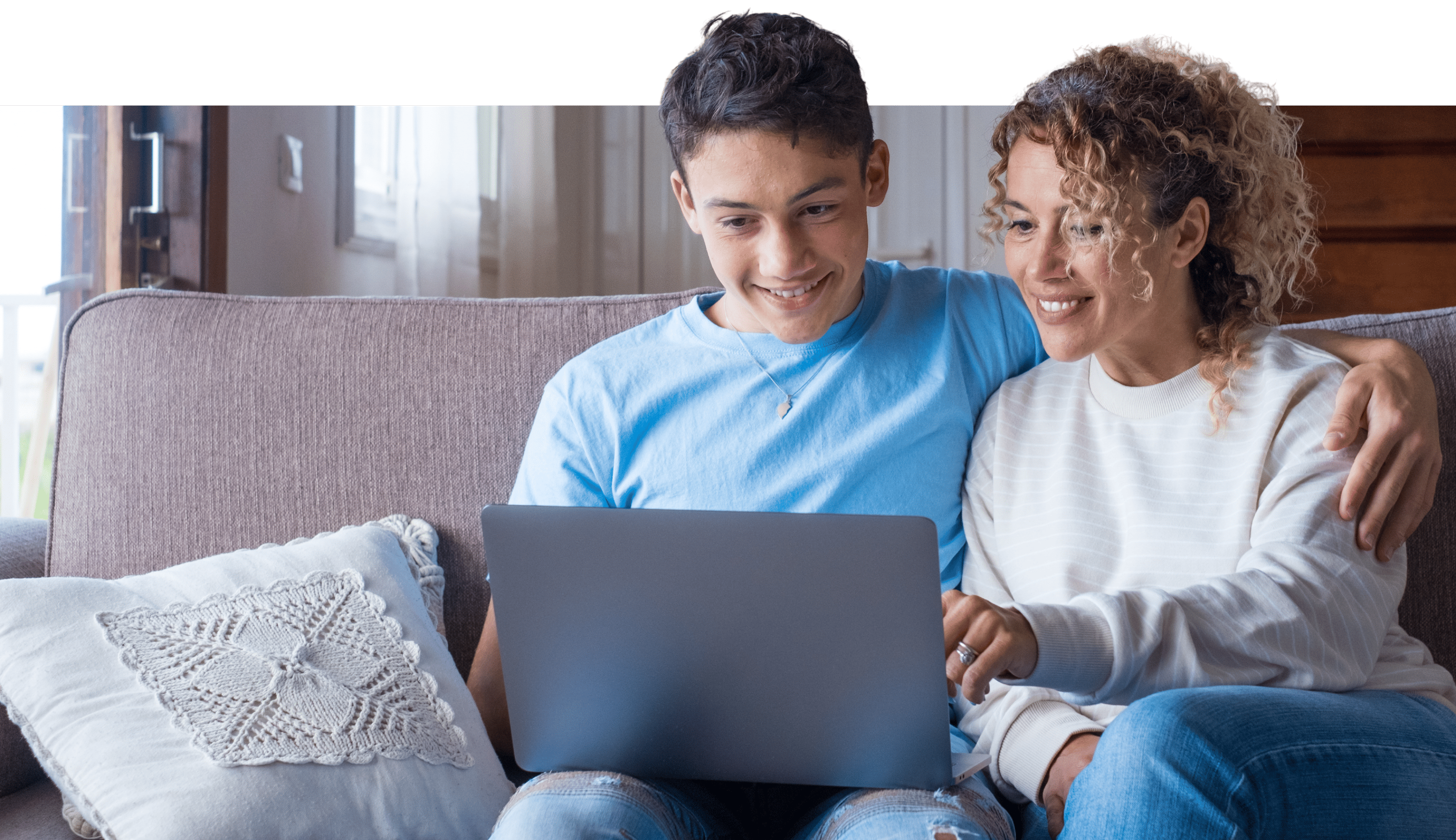women and son on laptop