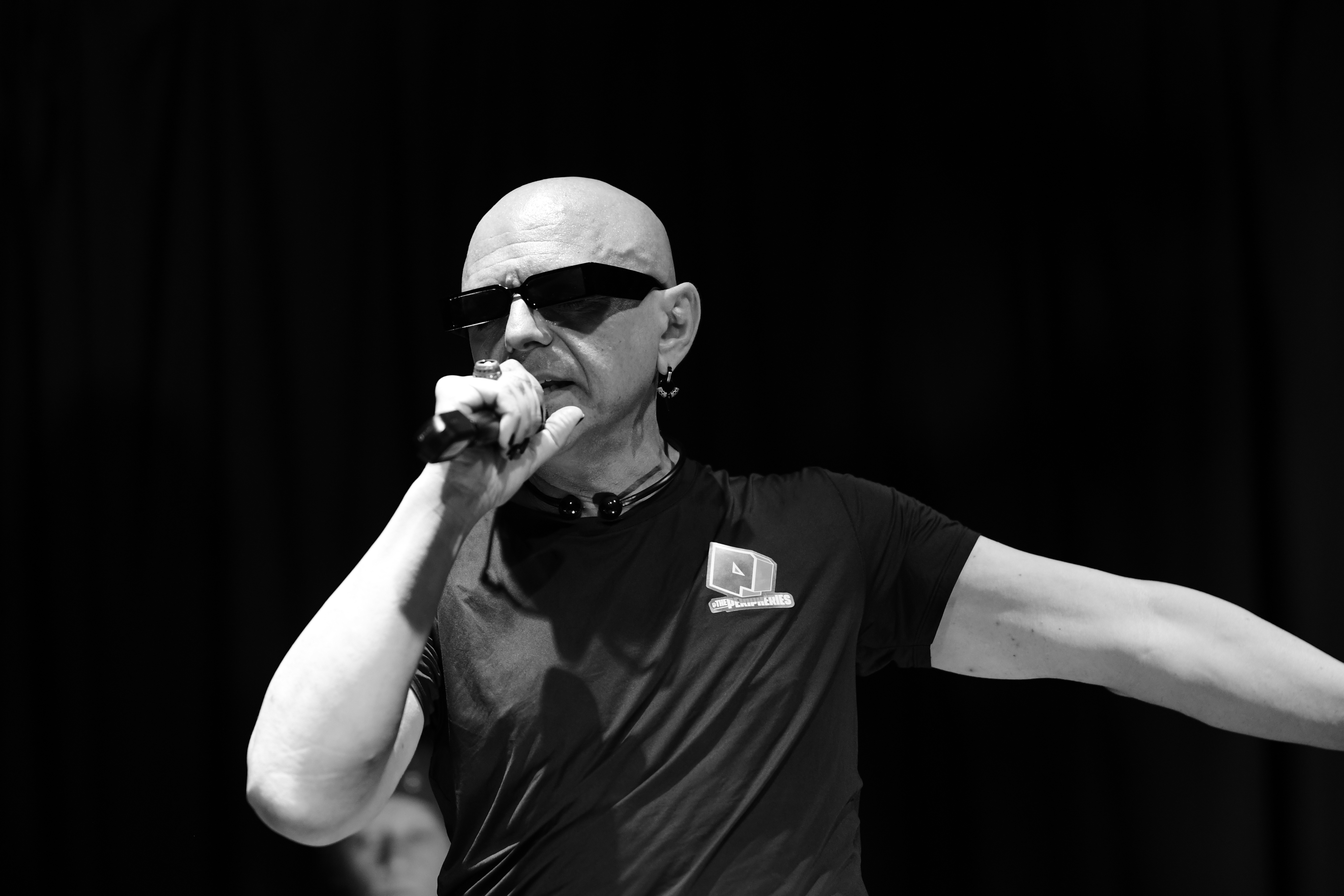 The Peripheries Lead Singer singing on stage