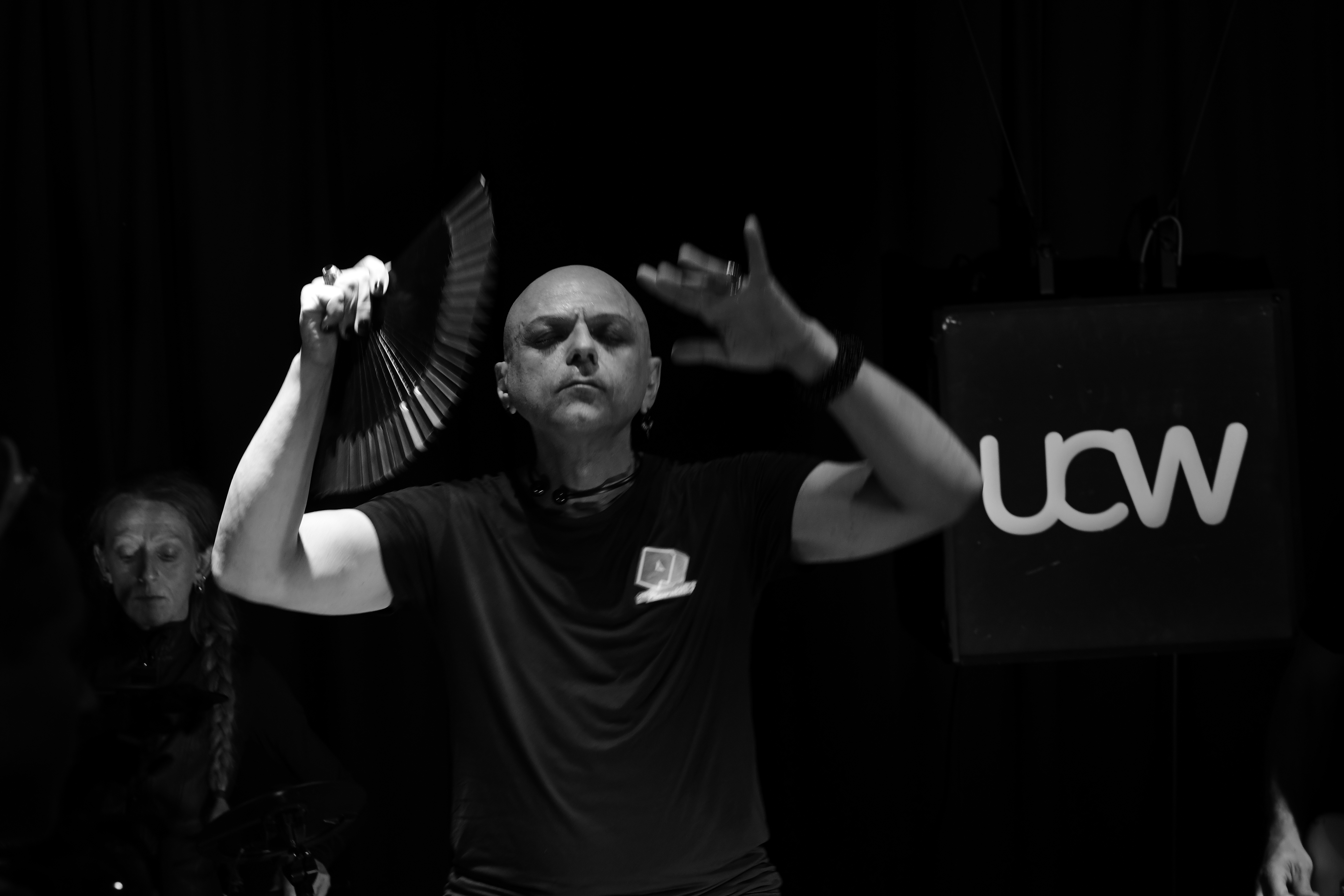 The Peripheries Lead Singer singing on stage