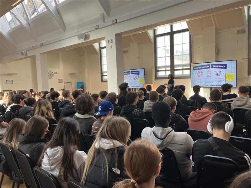 Learners watching talk in the conference centre