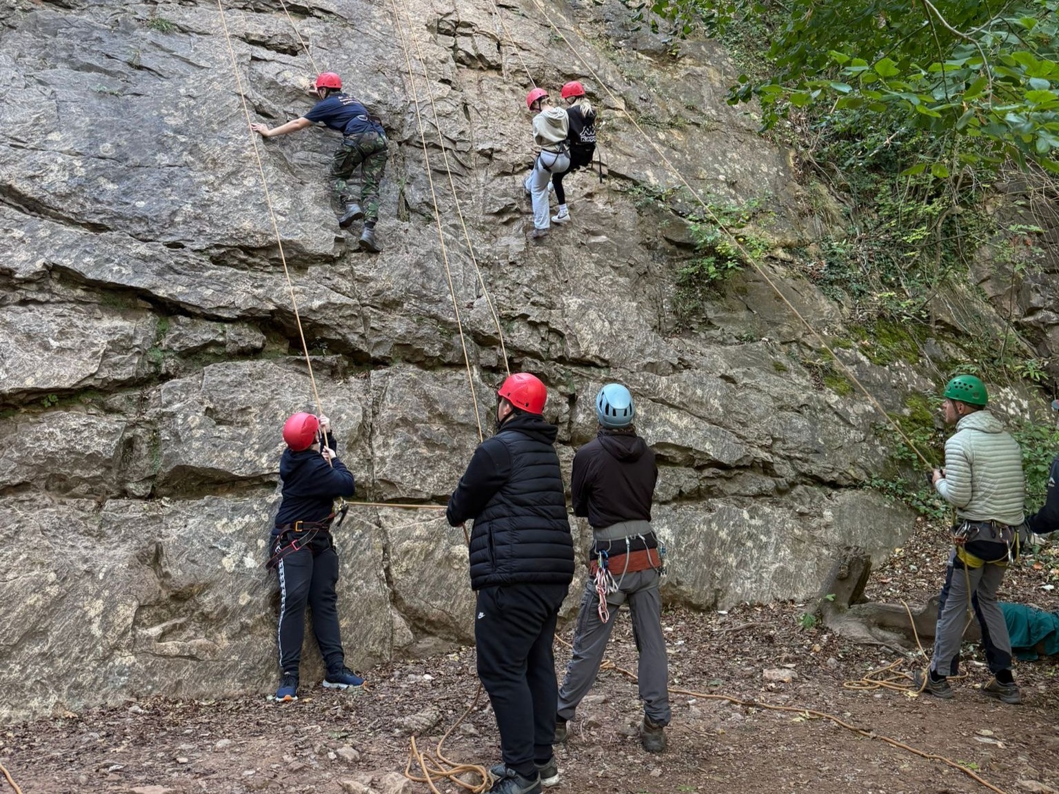 Students abseiling and climbing