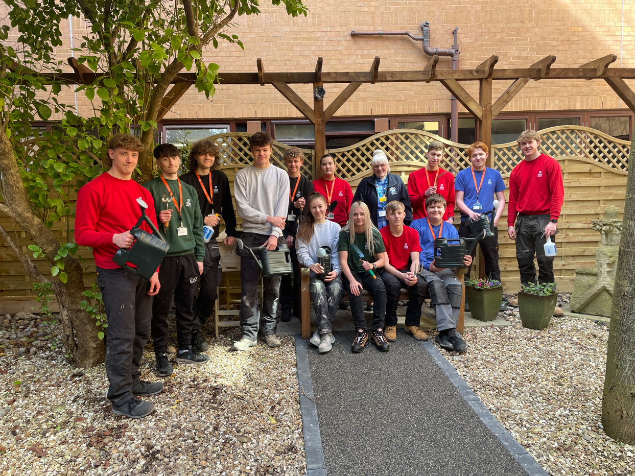 Construction Students Deliver Handmade Planters to Weston Hospital