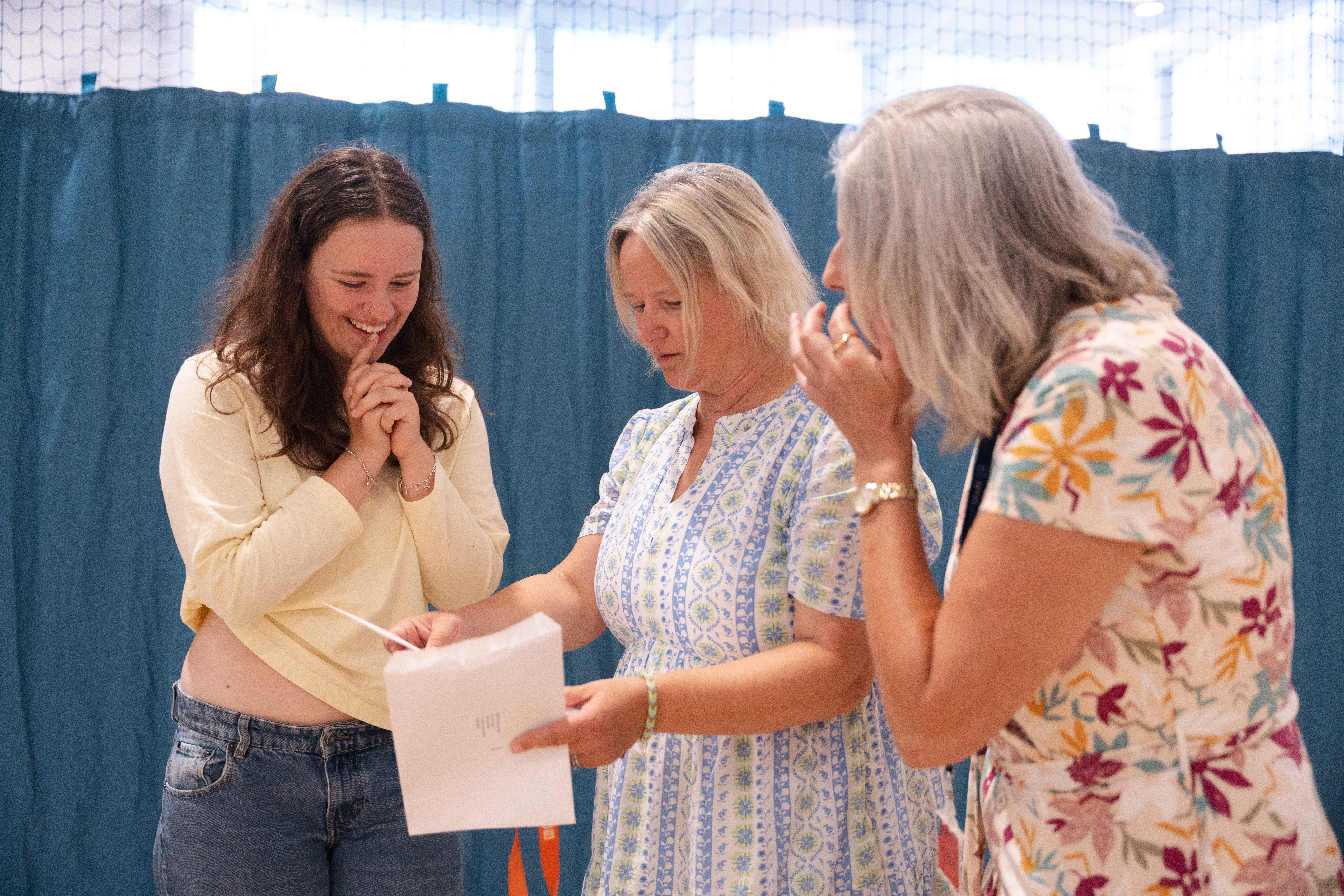 learner and parents looking at results together