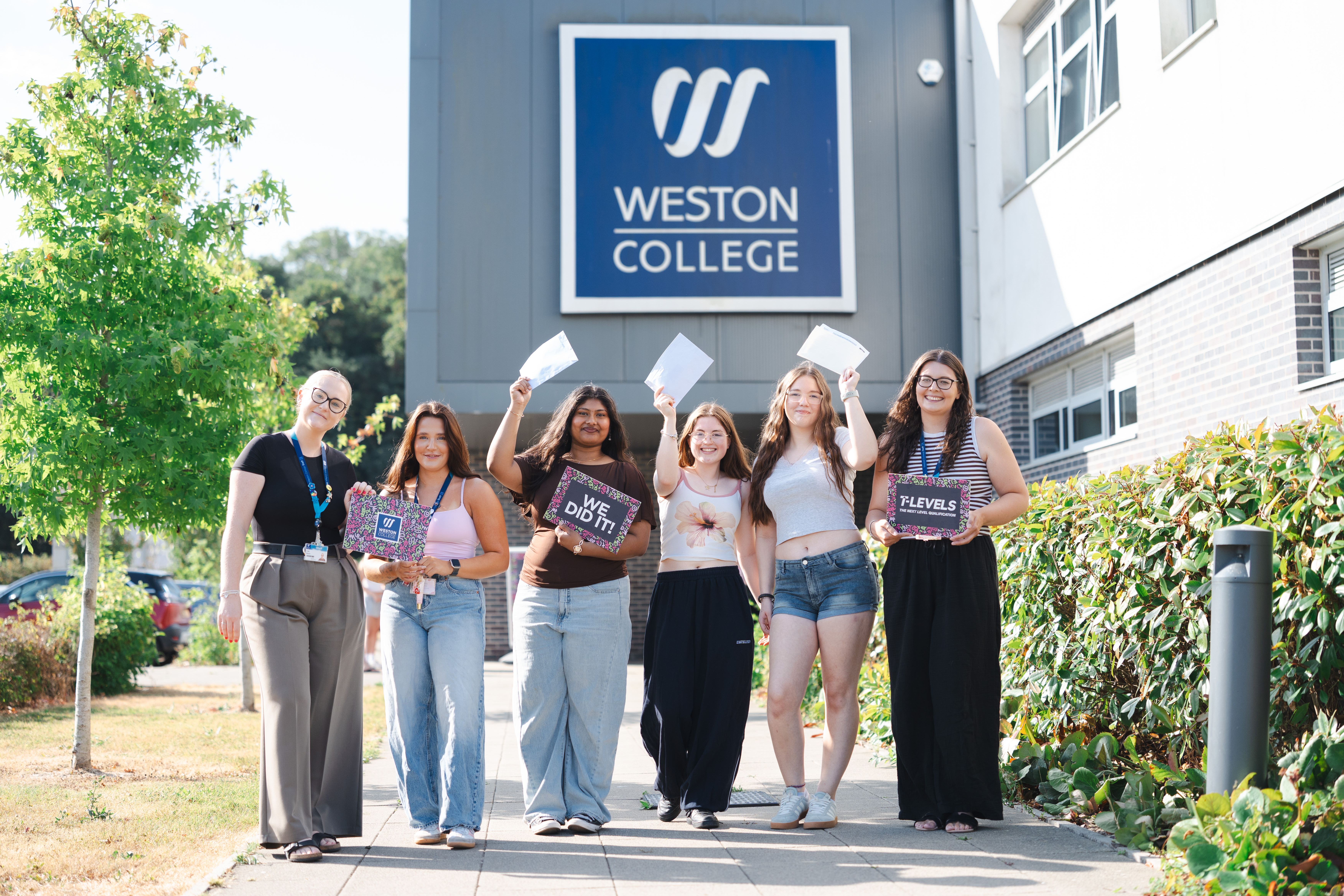 students with their results outside the Health and Active Living Skills Centre