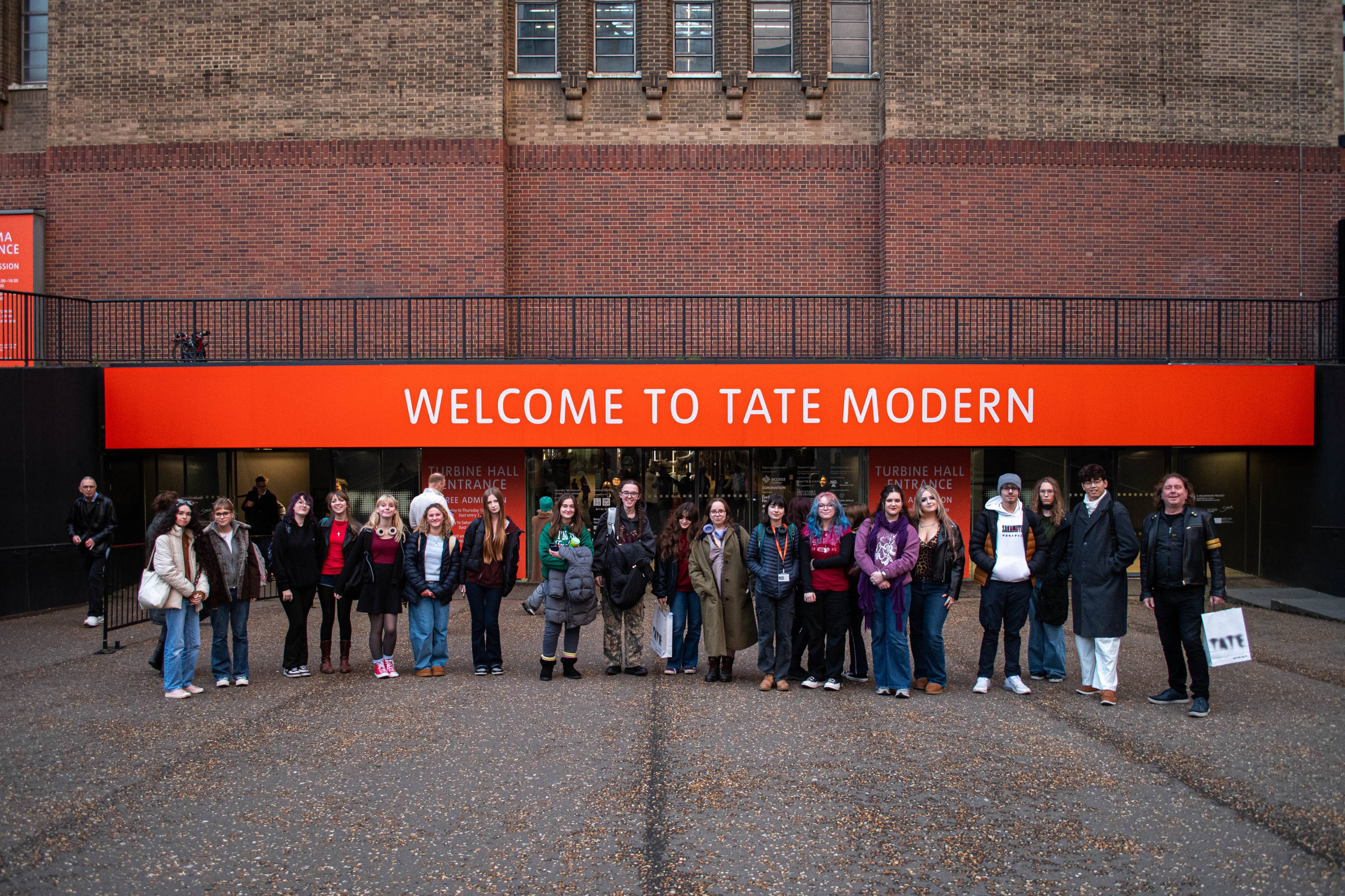 A Level Art students standing in front of the Tate Modern Gallery