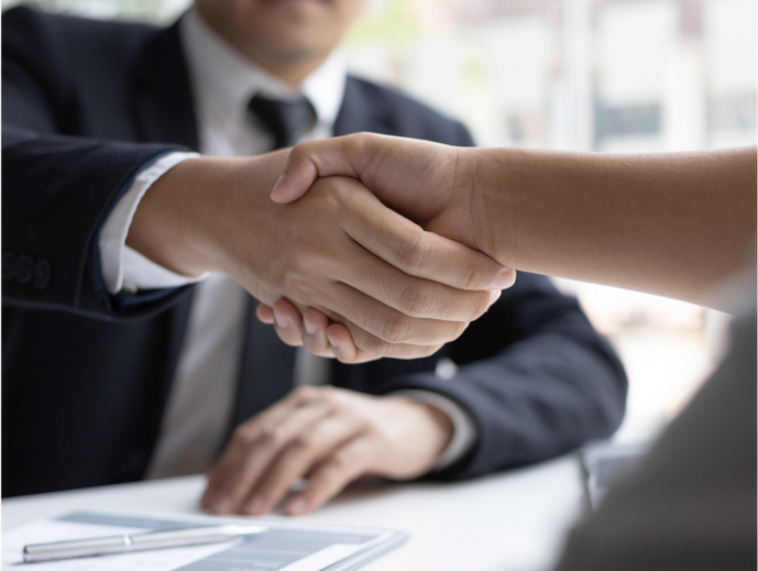 a closeup of a handshake