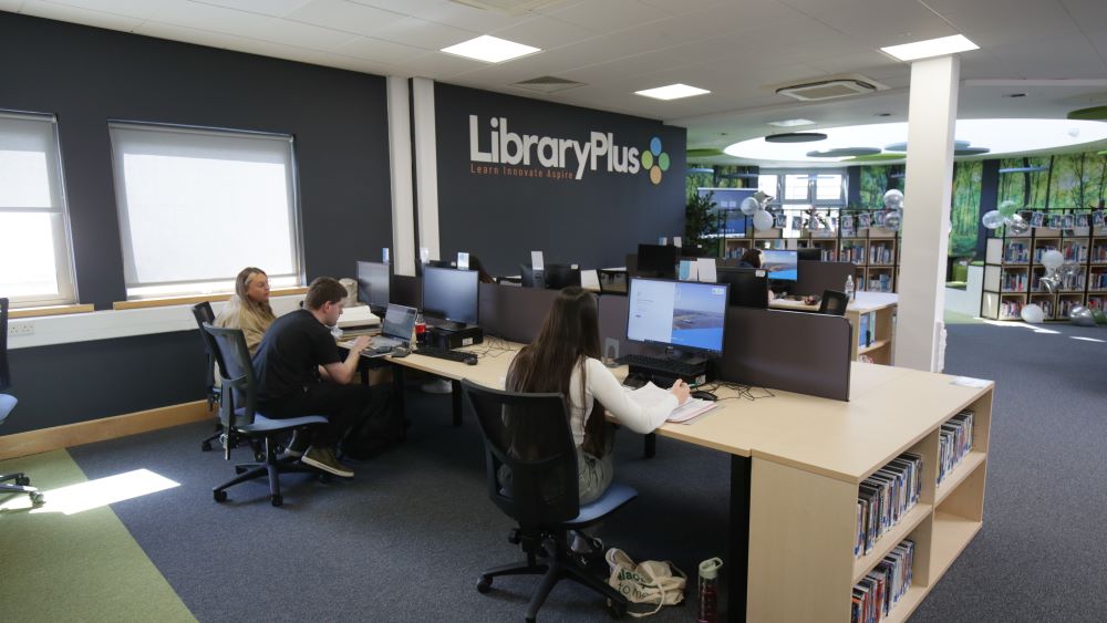 Students on laptops and computers at Loxton Library