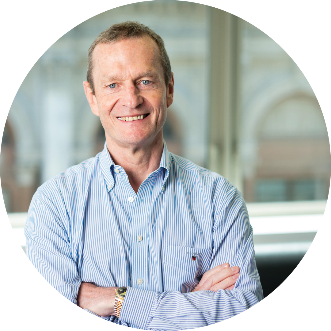 Paul Lowndes with arms crossed smiling