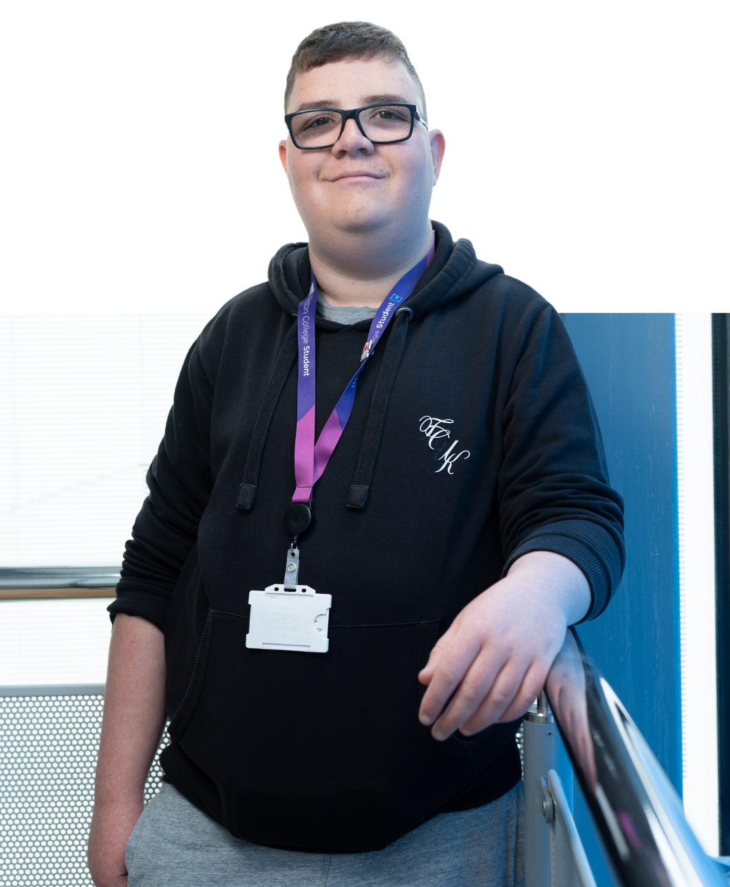 student harry smiling at the camera