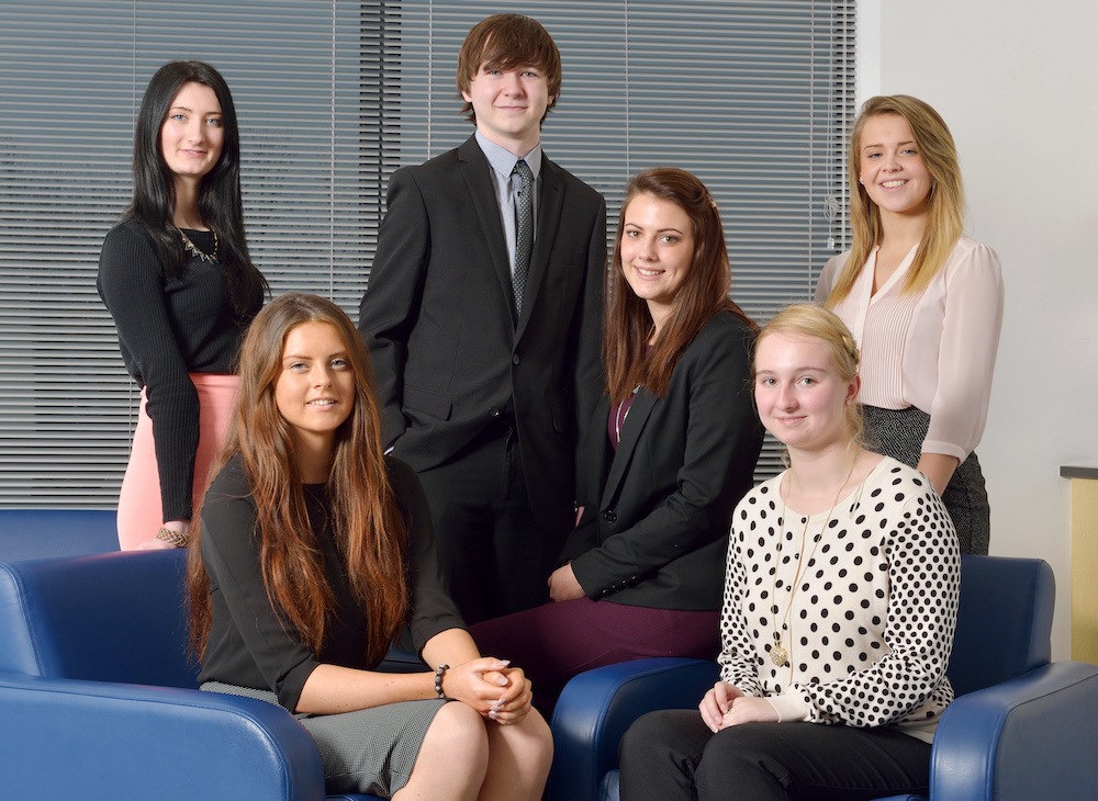 Group of people poseing for a picture