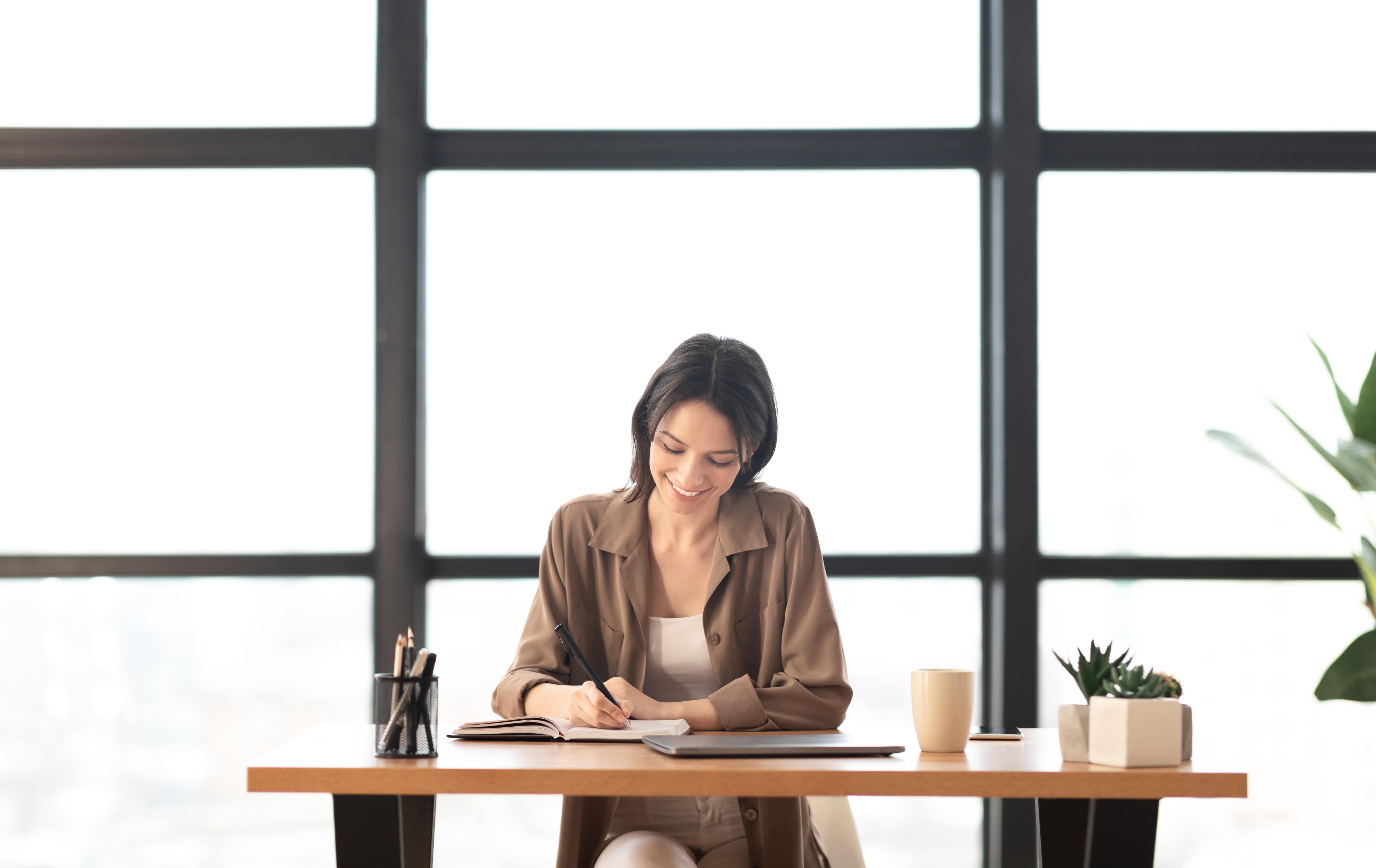 Personal assistant sitting at a desk
