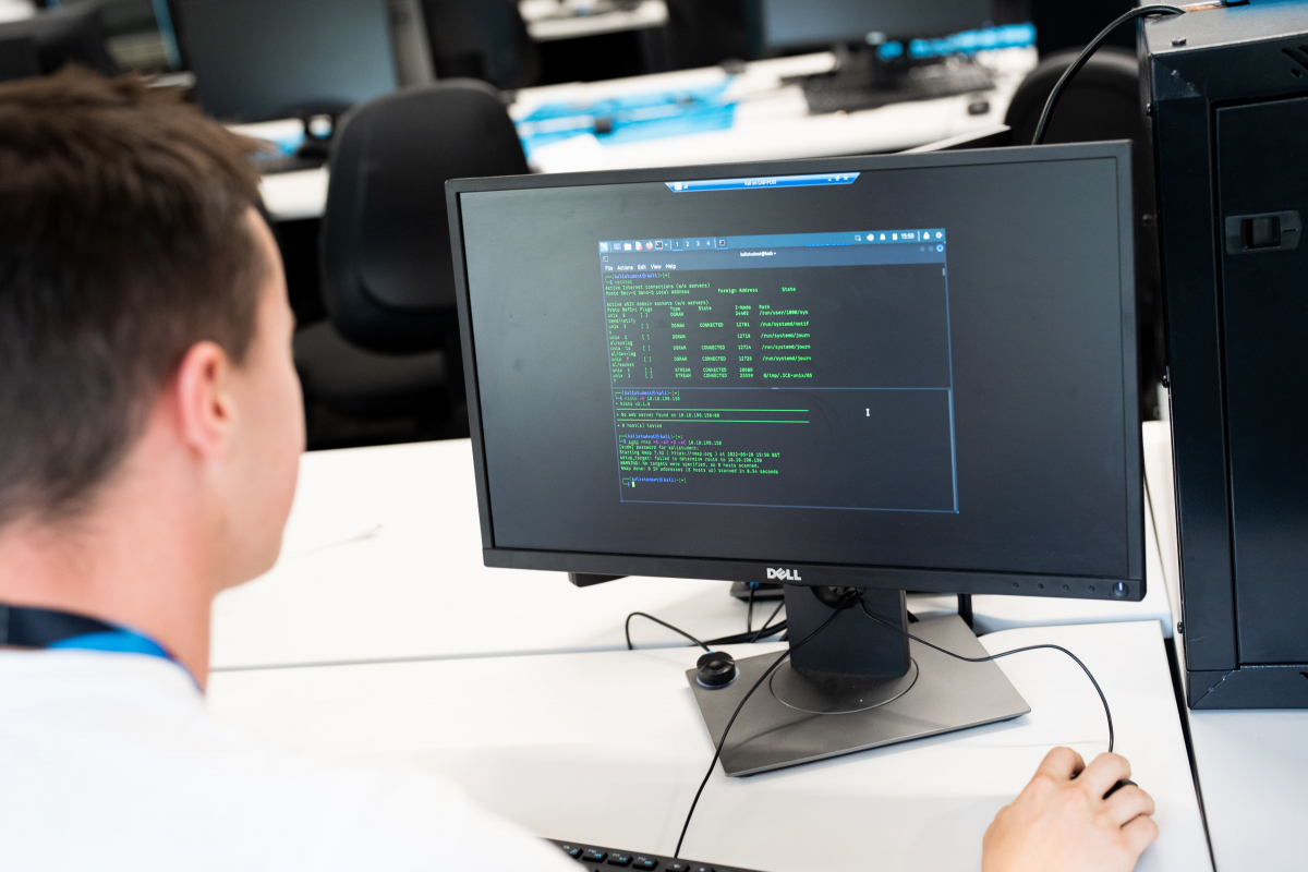 closeup of a student using a server communication program 