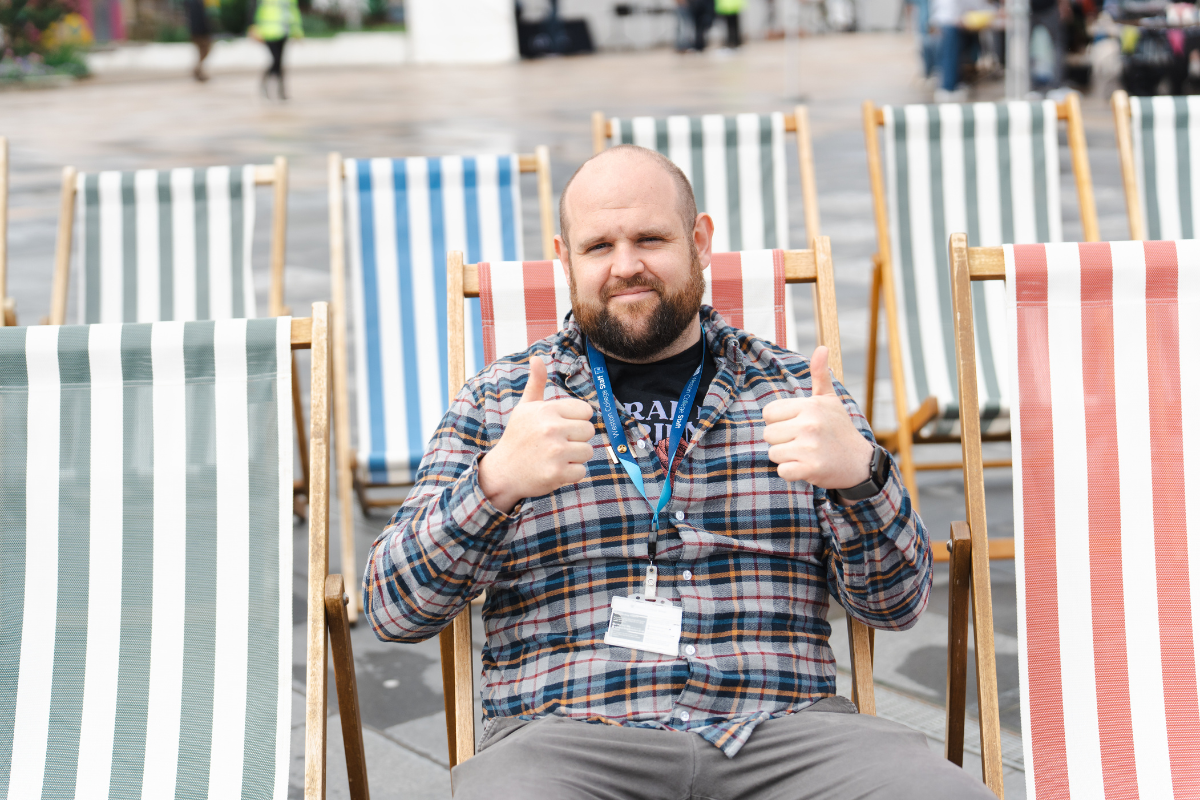 Staff member on deck chairs