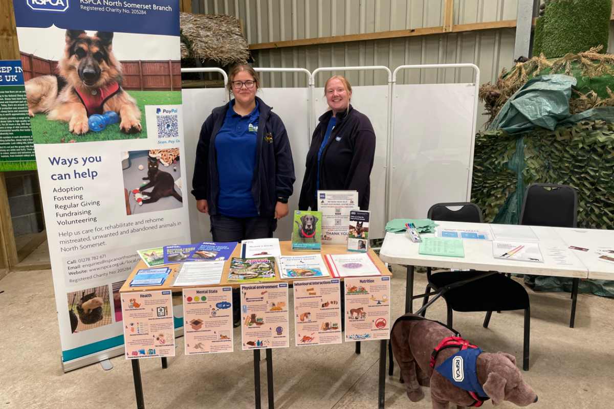 Former student, Grace, and her colleague from the RSPCA standing smiling