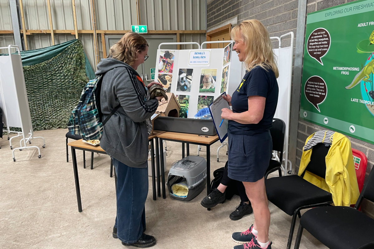 Students talking to employers 