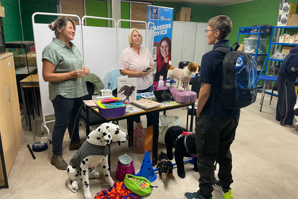 Students talking to employers 