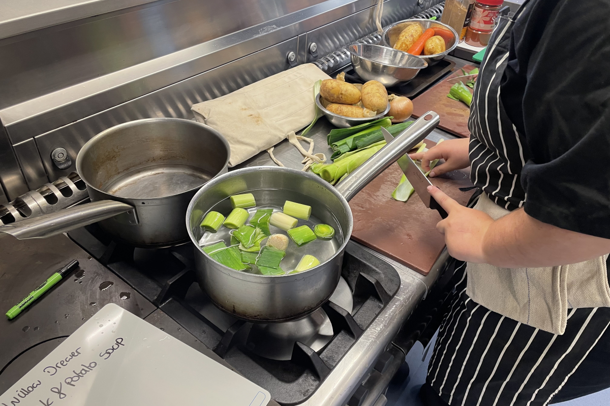Hospitality and Catering students making soup 