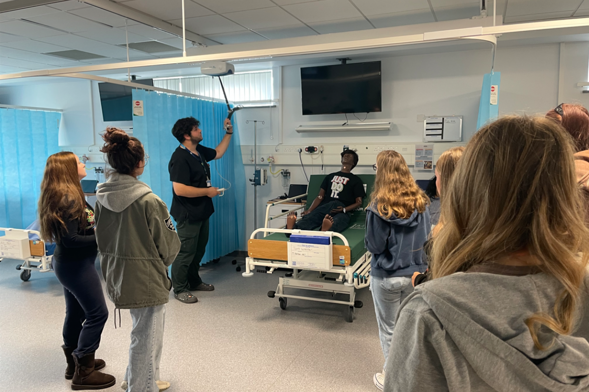 Health & Social Care students being introduced to the SIM room 