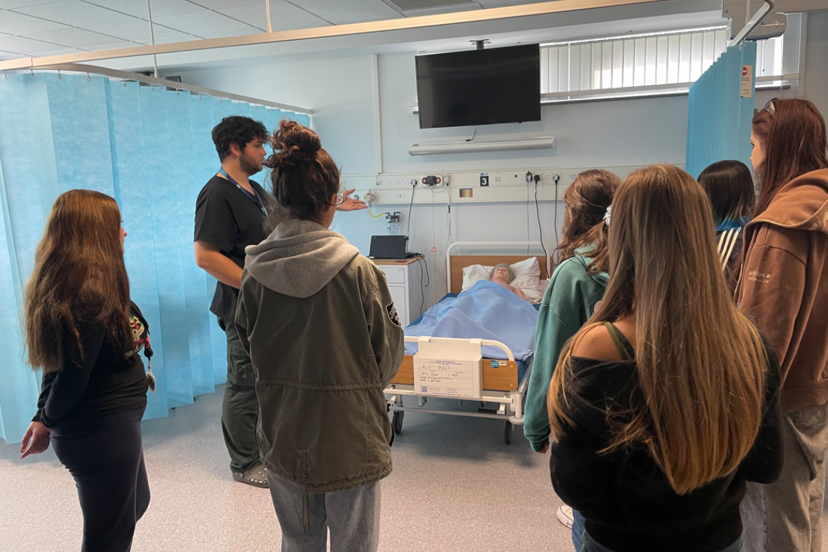 Health & Social Care students being introduced to the SIM room 