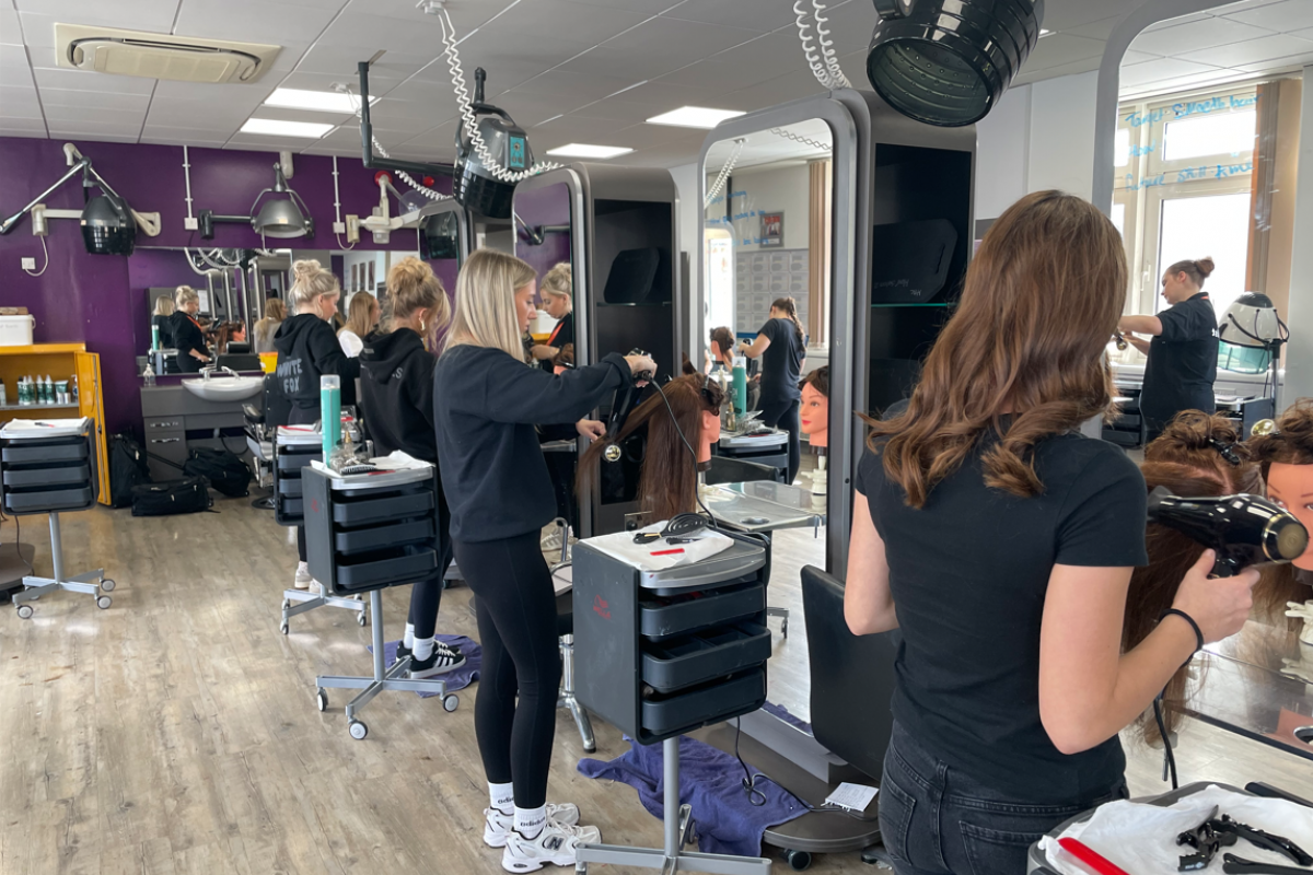 Hairdressing students doing a blowout 
