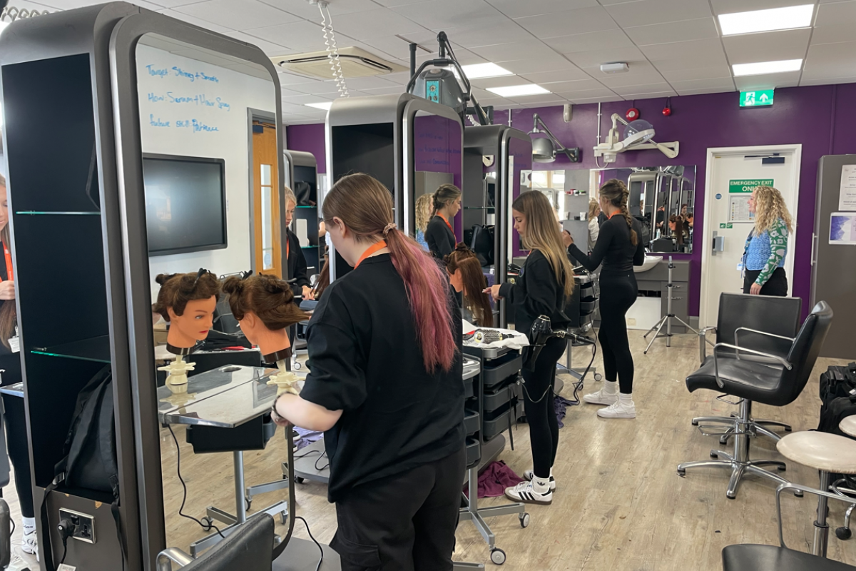 Hairdressing students doing a blowout 
