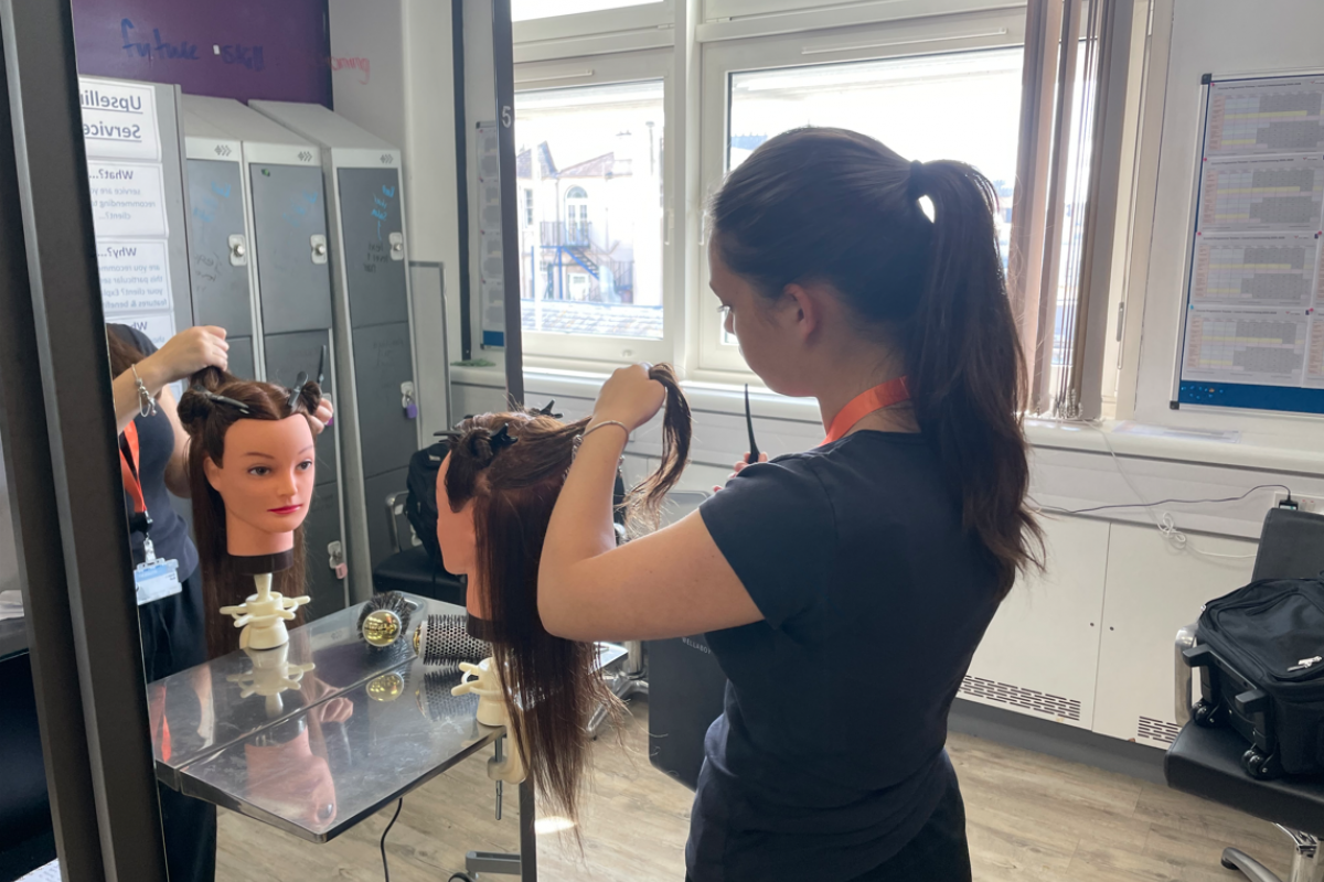 Hairdressing students doing a blowout 