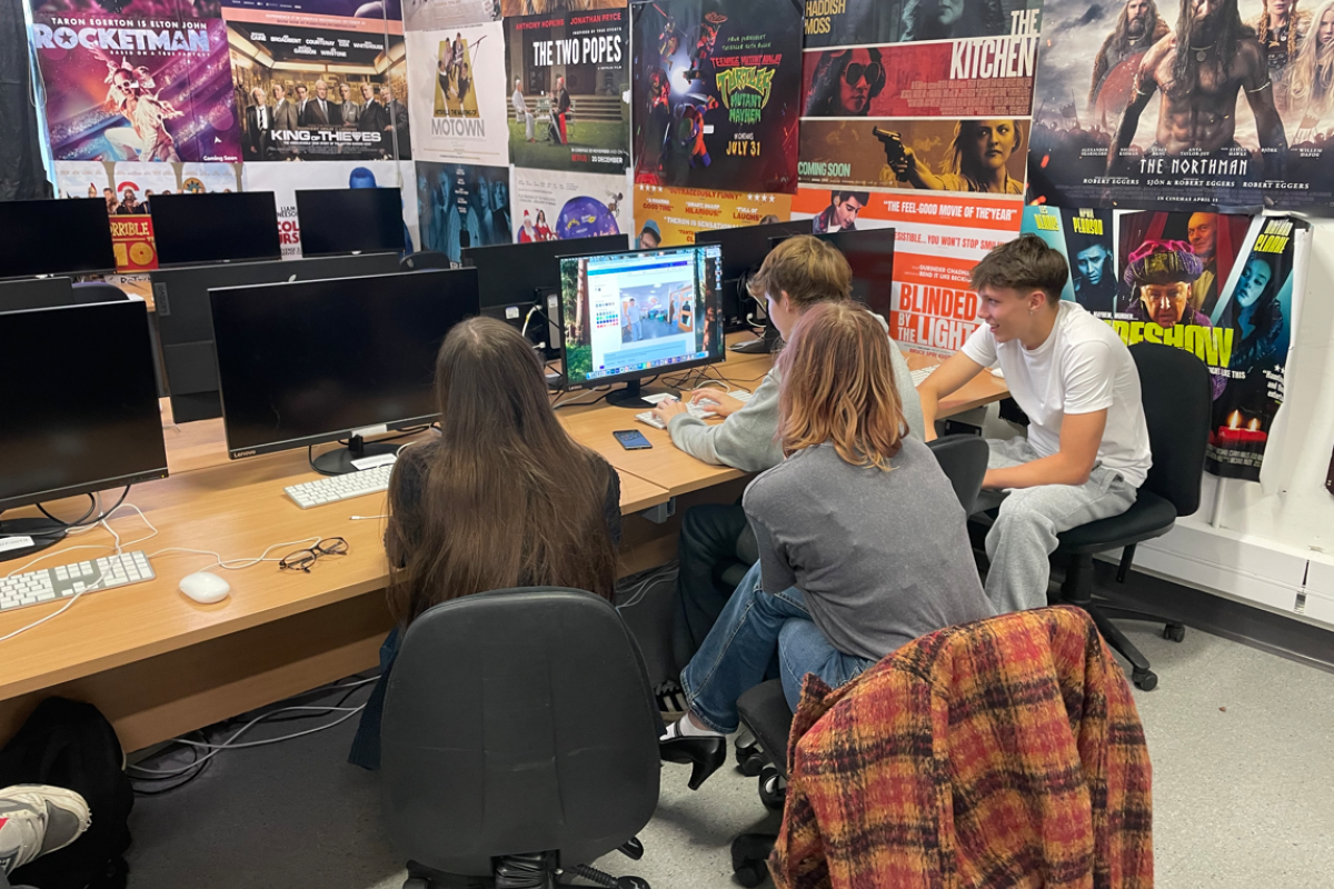 Media students editing their photographs 