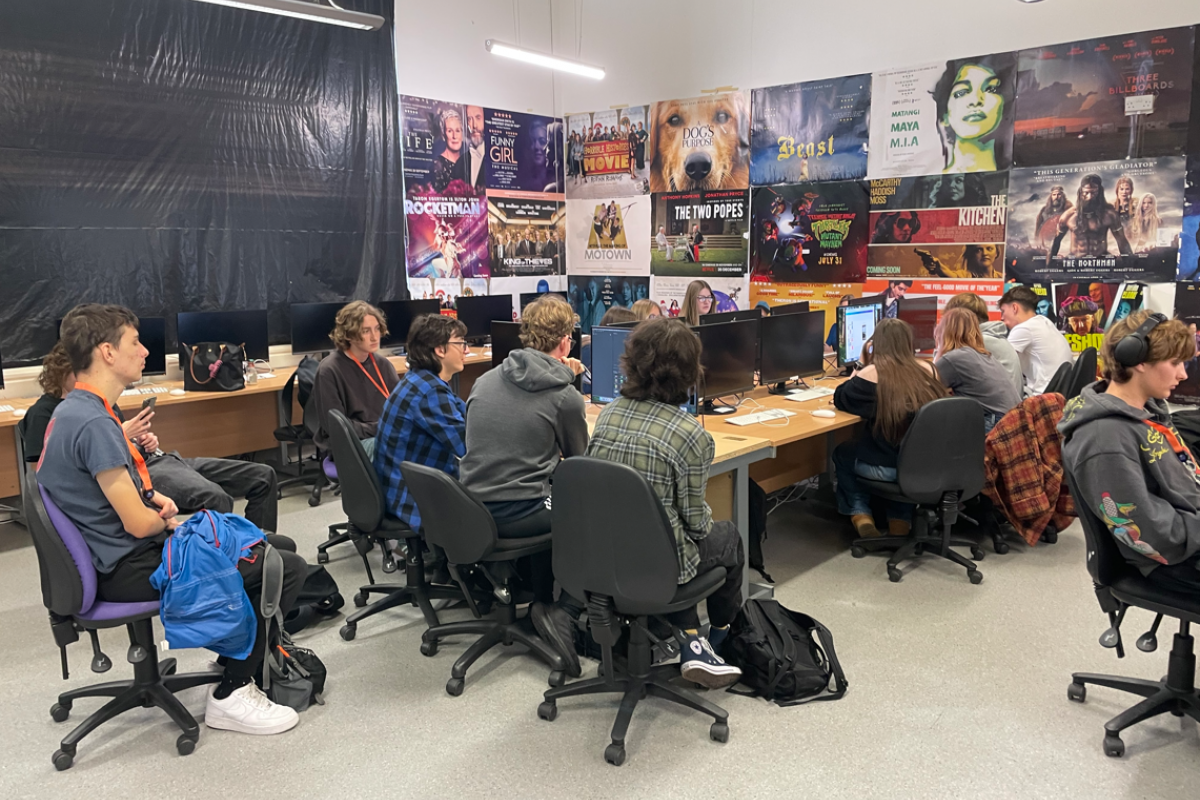 Media students editing their photographs 