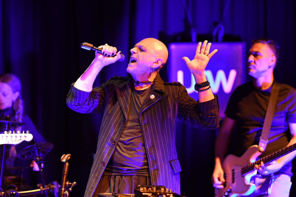 The Peripheries Lead Singer singing on stage