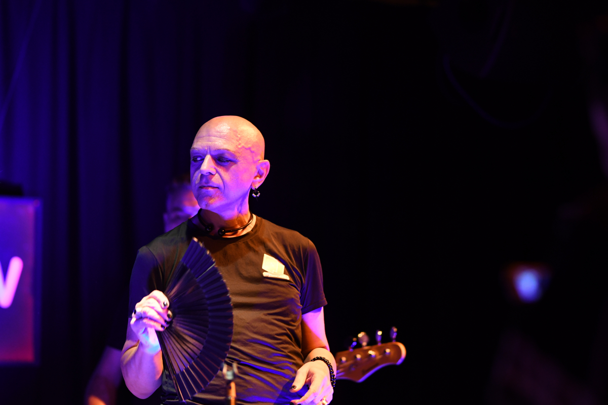 The Peripheries Lead Singer singing on stage 