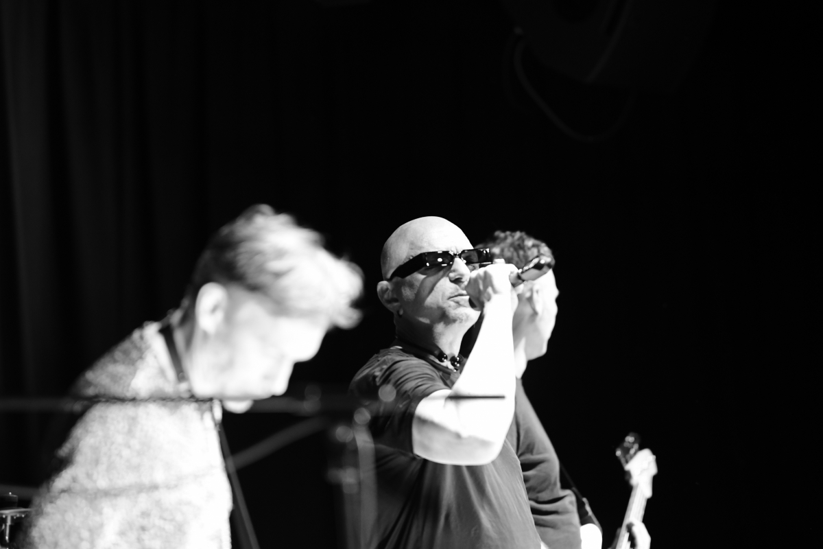 The Peripheries Lead Singer singing on stage 