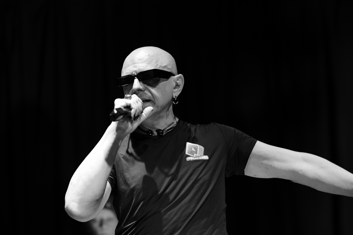 The Peripheries Lead Singer singing on stage 