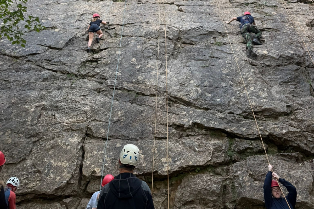 Students abseiling and climbing