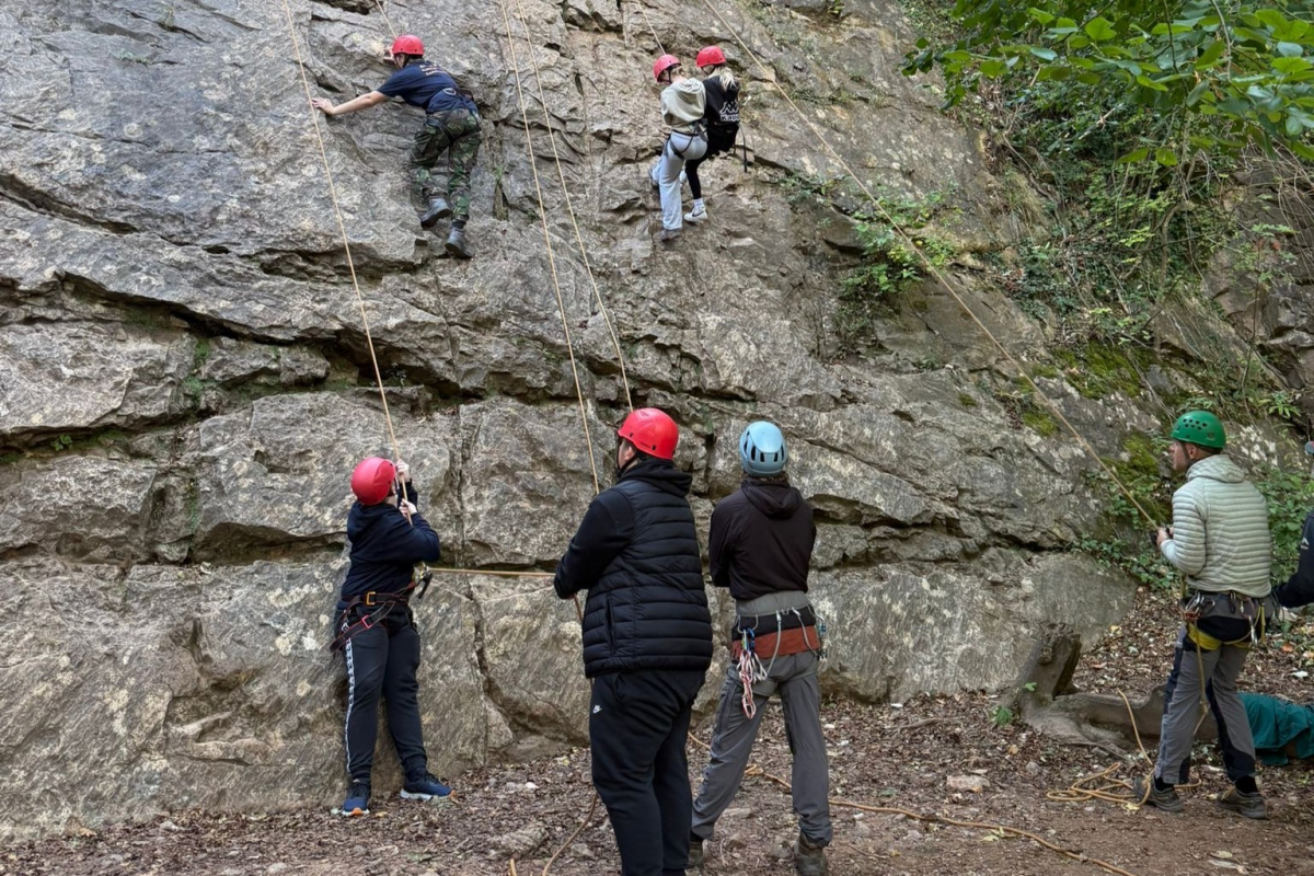 Students abseiling and climbing