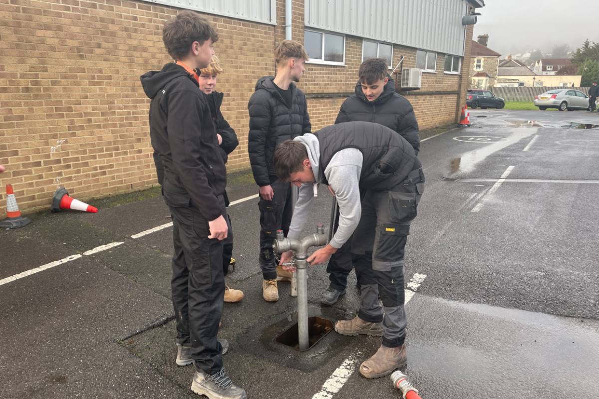 students tapping into fire hydrant water 