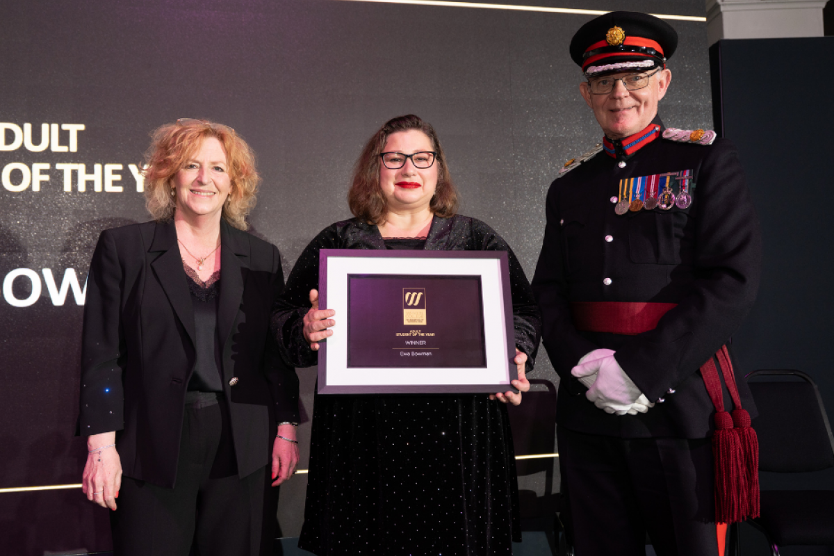 Ewa collecting her award at Celebration of Success 2025