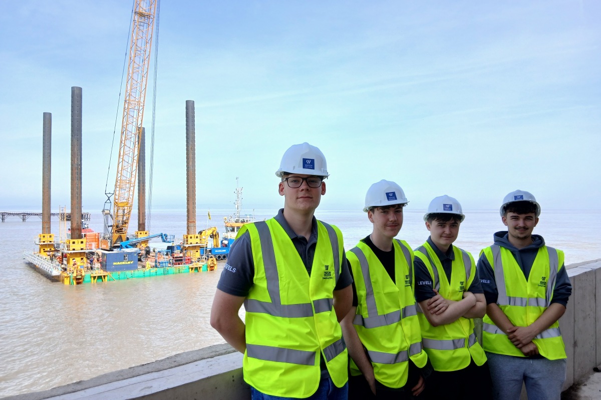 Students in front of jack-up barge